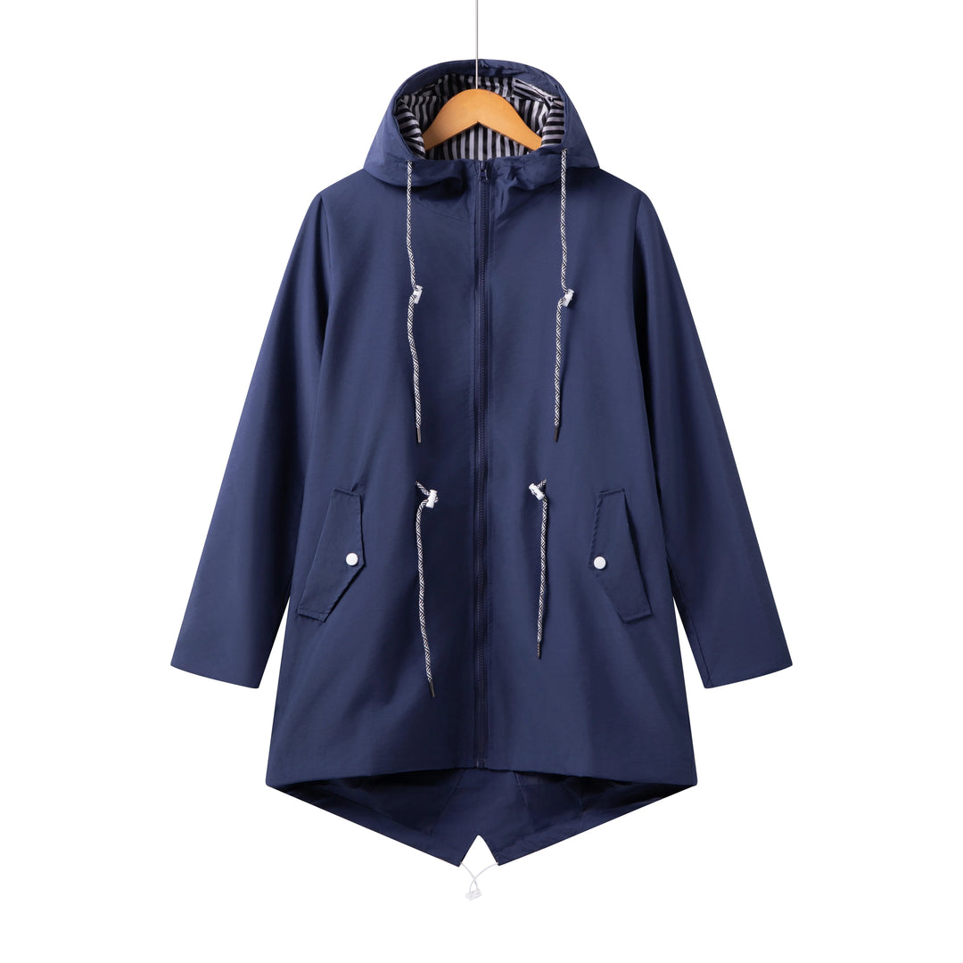 Women's travel-friendly lightweight waterproof raincoat, featuring a hood for ultimate rain protection.