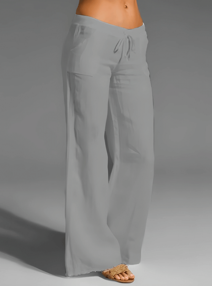 Versatile women's wide leg linen blend trousers. Mid-rise casual pants for comfortable summer wear.