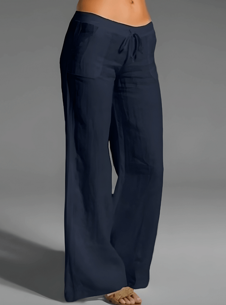 Relaxed fit women's linen blend wide leg trousers. Breathable and comfortable mid-rise casual pants.