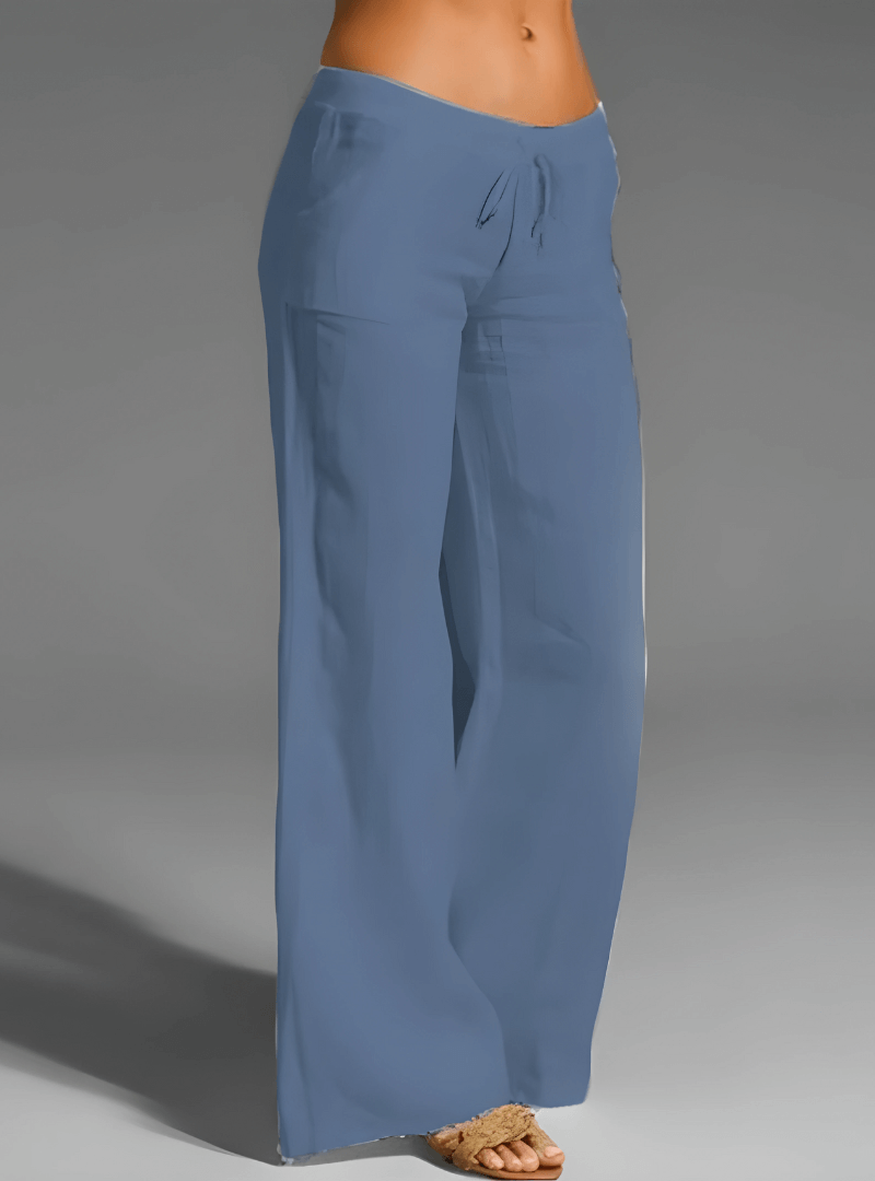 Stylish women's linen blend wide leg trousers with a comfortable, relaxed fit. Perfect for summer casual wear.