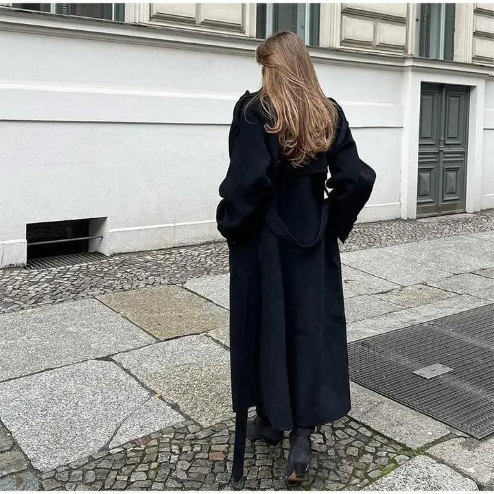 Effortless women's long trench coat with belted waist, a chic oversized outerwear for fall/spring.