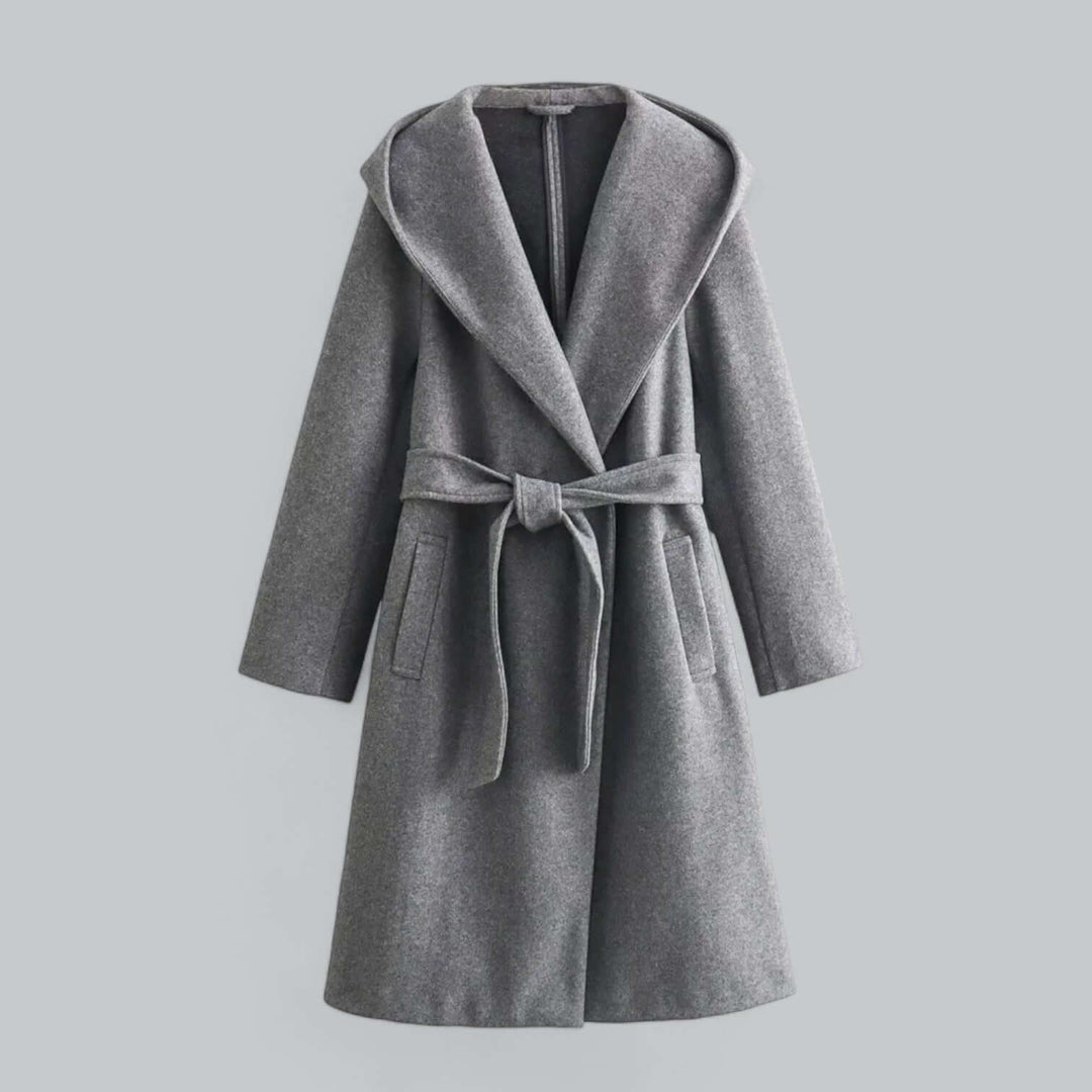 Chic women's hooded long trench coat, an elegant belted jacket for stylish autumn fashion.