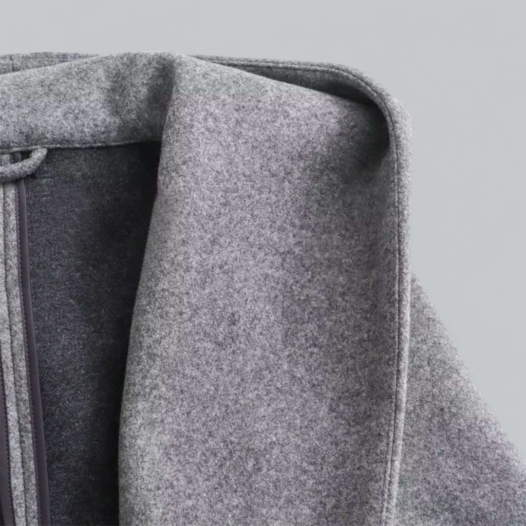 Stylish women's long hooded trench coat, perfect for spring, autumn, & mild winter fashion.