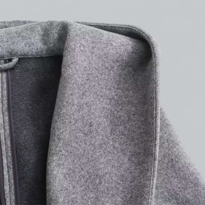 Stylish women's long hooded trench coat, perfect for spring, autumn, & mild winter fashion.