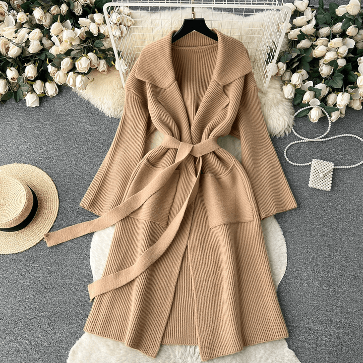 Open-front women's long knit cardigan with a ribbed texture, ideal for versatile everyday wear.