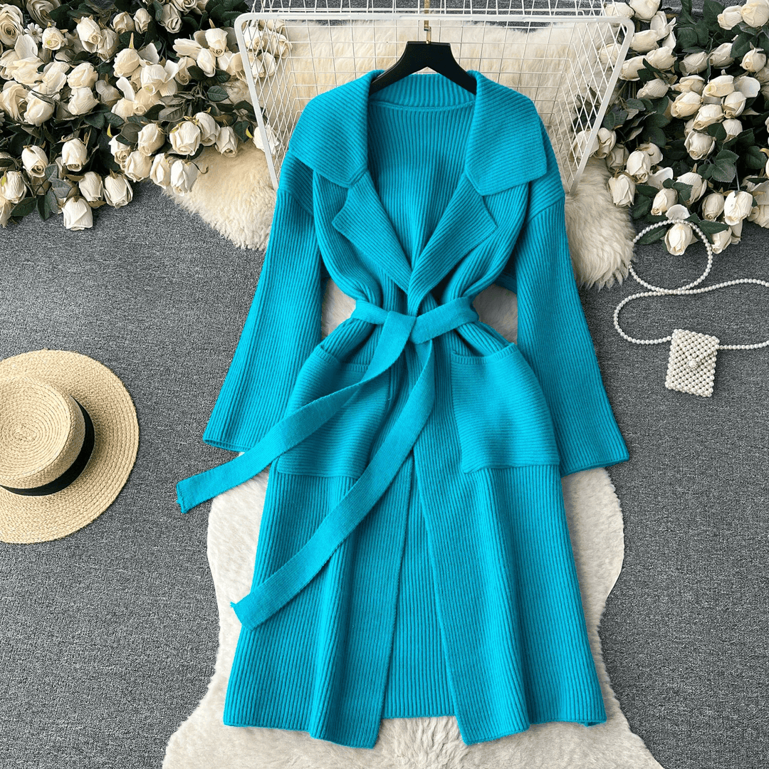 Cozy women's long knit sweater with a shawl collar, perfect for comfortable and fashionable outerwear.