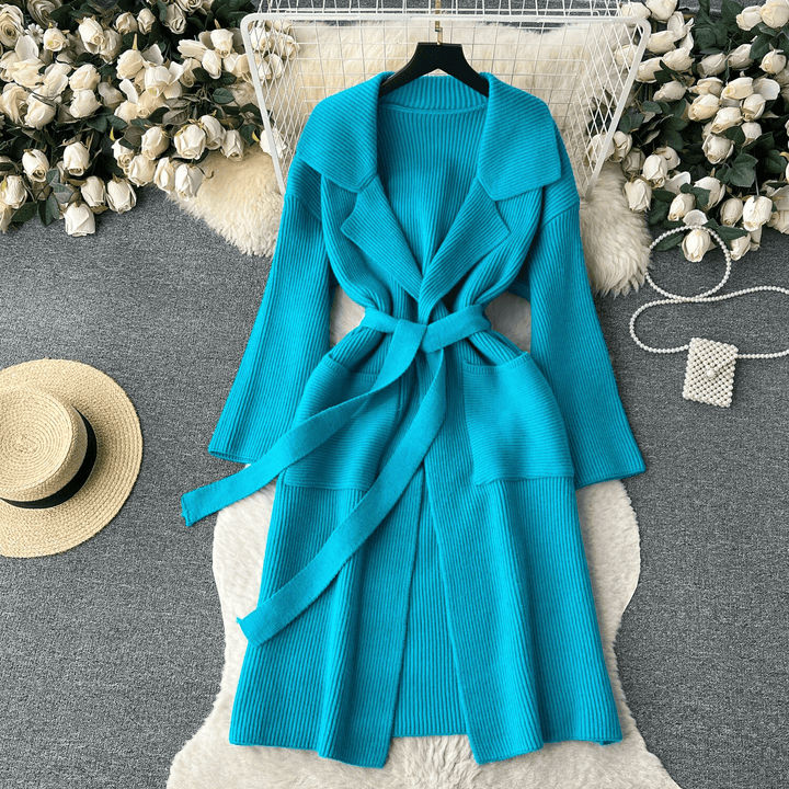 Cozy women's long knit sweater with a shawl collar, perfect for comfortable and fashionable outerwear.