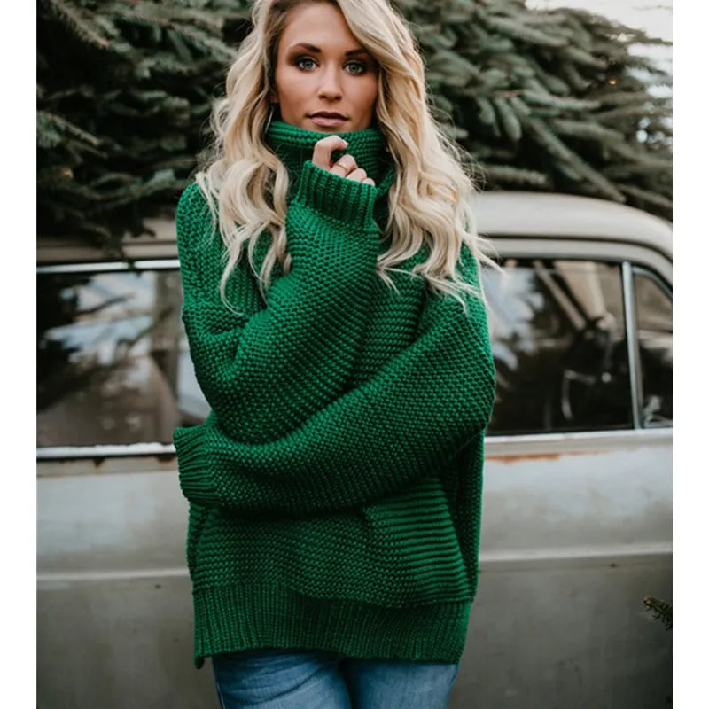 Women's long knit turtleneck sweater. Relaxed, oversized fit for cozy winter fashion. Stylish & versatile.