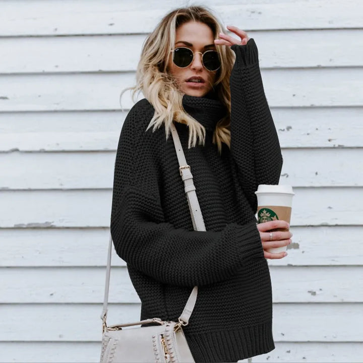 Cozy green women's long knit turtleneck sweater. Relaxed fit, perfect for stylish winter comfort.