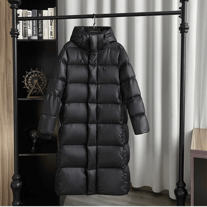 Women's long padded jacket for winter. Stylish & warm puffer coat for cold weather fashion.