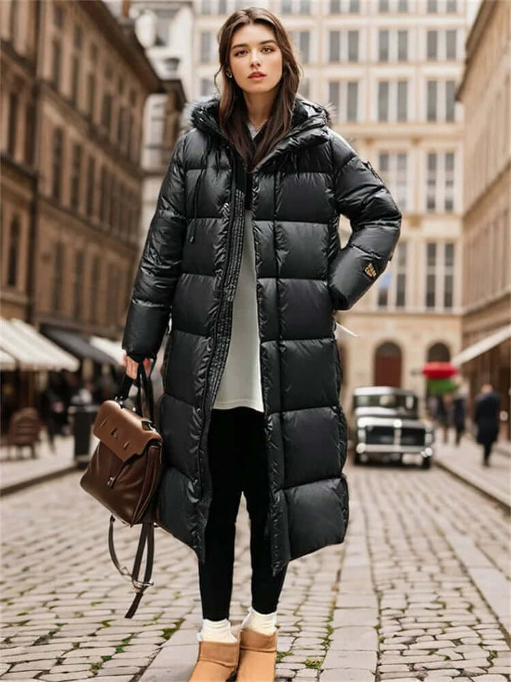 Women's long puffer coat, a warm and stylish padded jacket. Ideal winter outerwear for cold days.