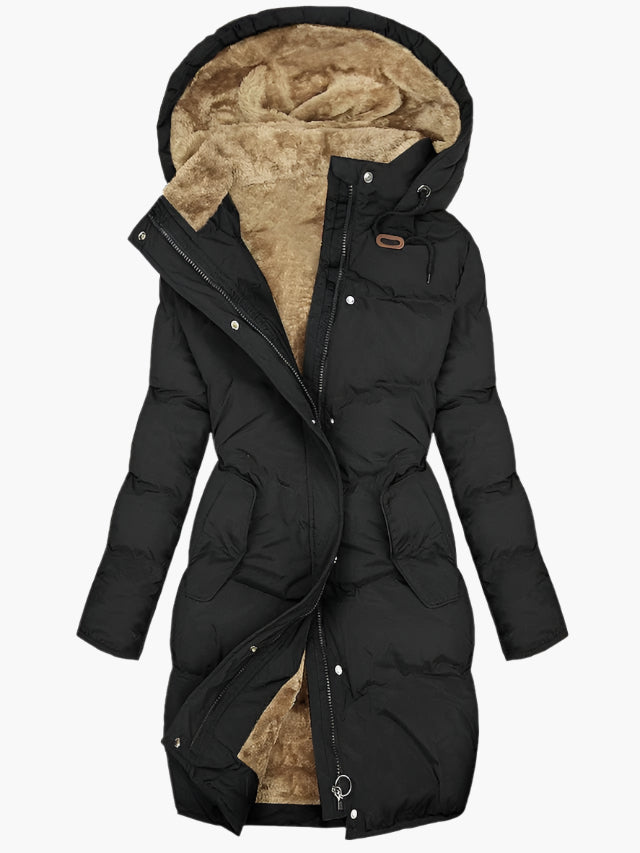 Stylish women's long quilted hooded jacket, ideal for everyday winter fashion & cozy cold weather comfort.