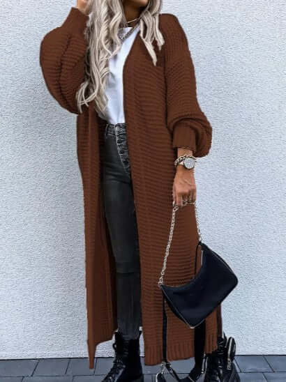 Modern women's long sleeve open front knitted sweater. A stylish layering piece for any outfit.