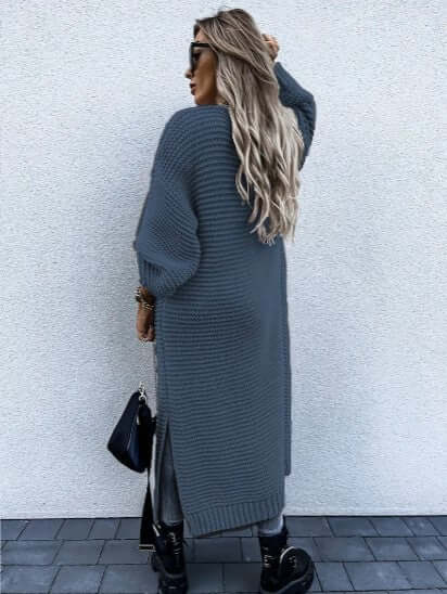 Women's long sleeve open front knitted cardigan. A versatile and warm addition to any wardrobe.