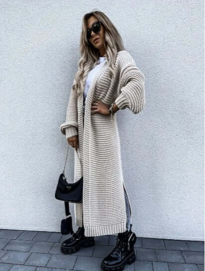 Acrylic blend women's long sleeve open front knitted cardigan. Stylish & warm layering piece.