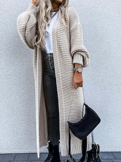 Elegant women's open front knitted cardigan. Long sleeve, perfect for casual chic autumn fashion.