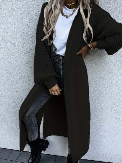 Stylish women's long sleeve open front knitted cardigan. Perfect for elegant autumn fashion.