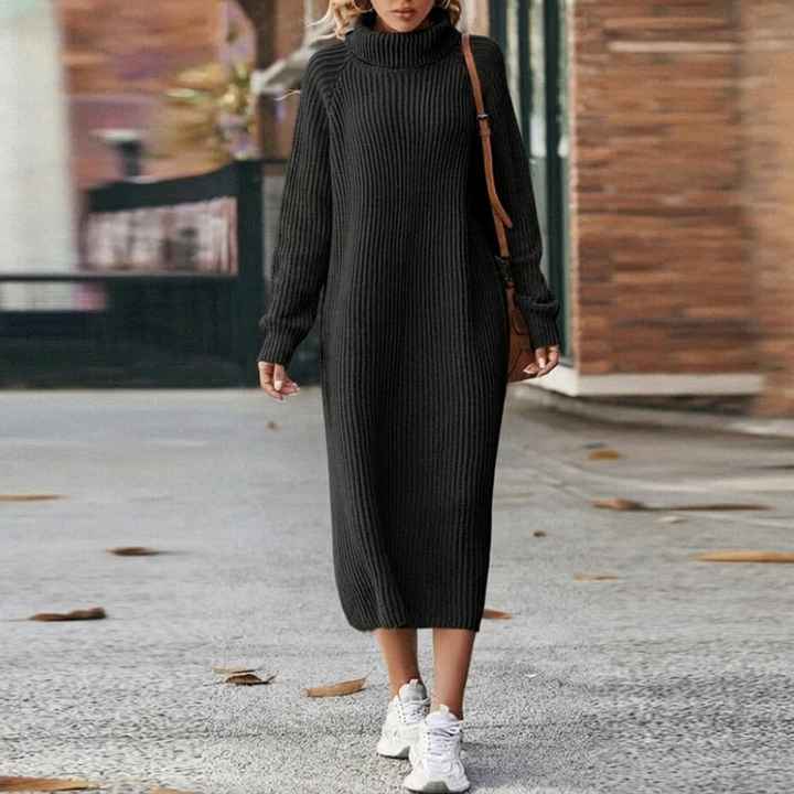 Cozy long sleeve roll neck knit dress for women. Stylish oversized midi perfect for warm winter fashion.