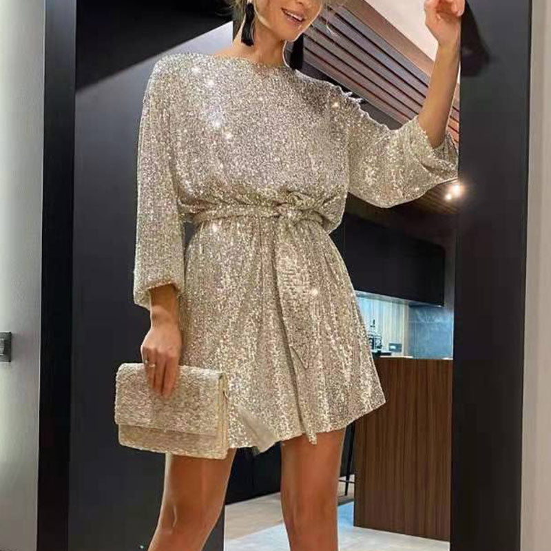 Women's long sleeve sequin mini cocktail dress in sparkling silver, perfect for parties & special occasions.