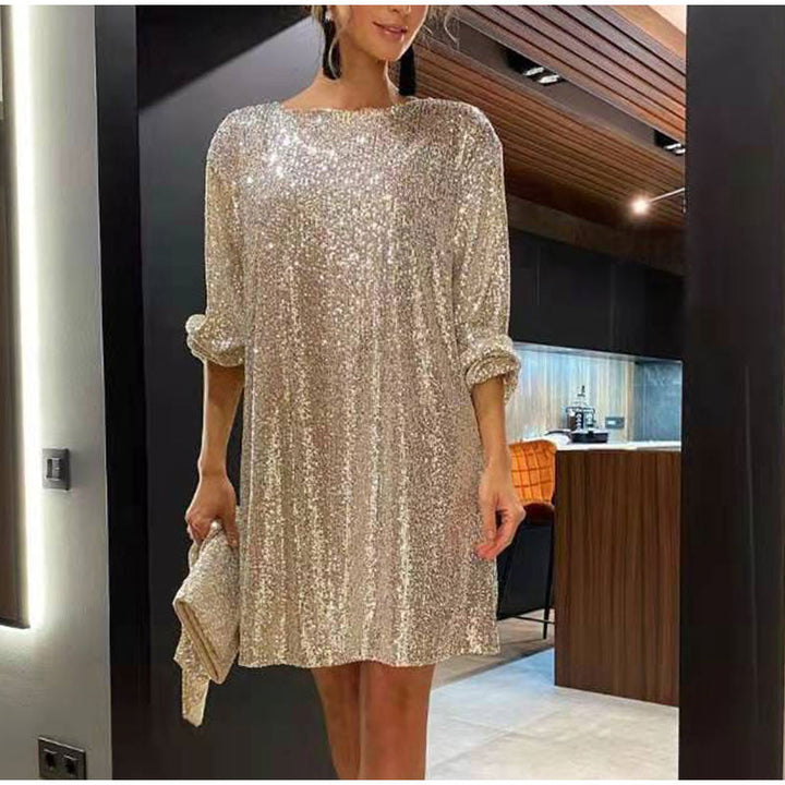 Glamorous women's sequin mini party dress with long sleeves, ideal for club wear or a holiday event.