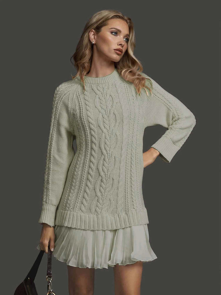 Sophisticated women's long sleeve winter dress. Textured bodice, pleated mini hem. Ideal for elegant casual styling.