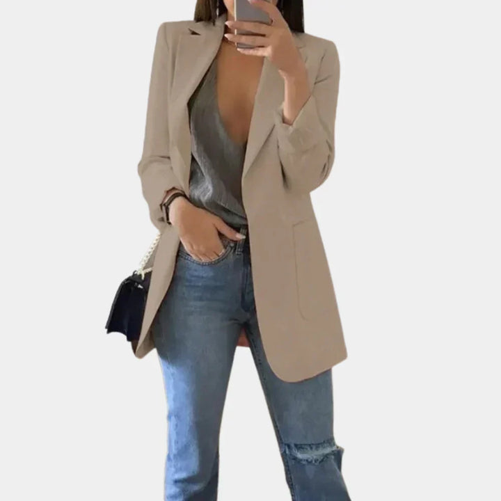Elegant women's long slim fit blazer, perfect for professional office wear, adding a sophisticated touch.