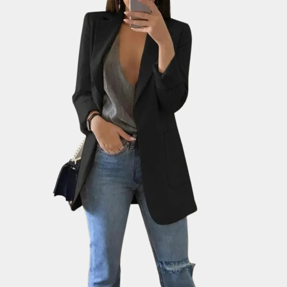 Timeless women's long slim fit blazer, a fashionable outerwear choice for elegance and versatile styling.