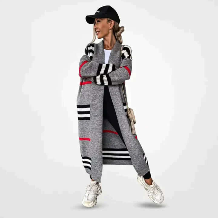 Women's elegant long striped knit cardigan. Lightweight design, ideal for versatile fall fashion & comfortable layering.