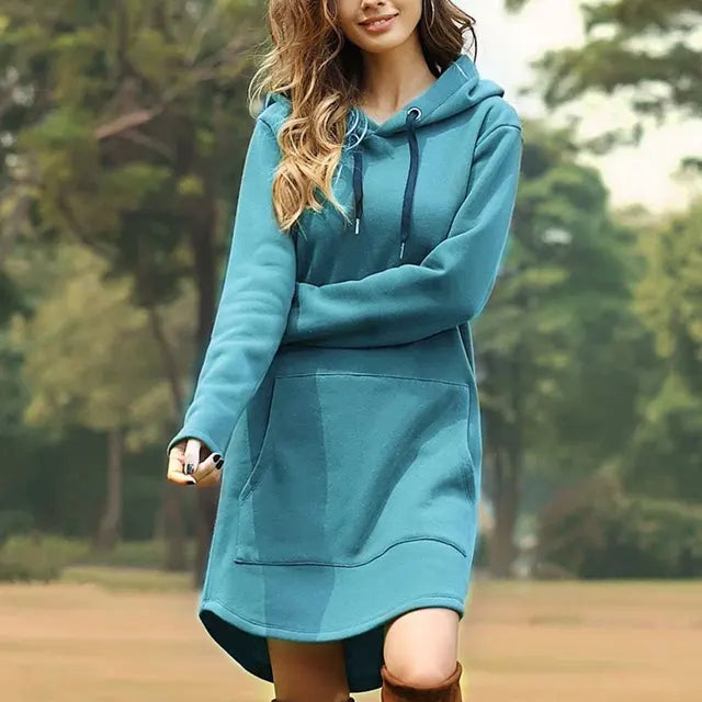 Stylish women's fall fashion hoodie. Long, oversized, and warm for ultimate winter comfort.