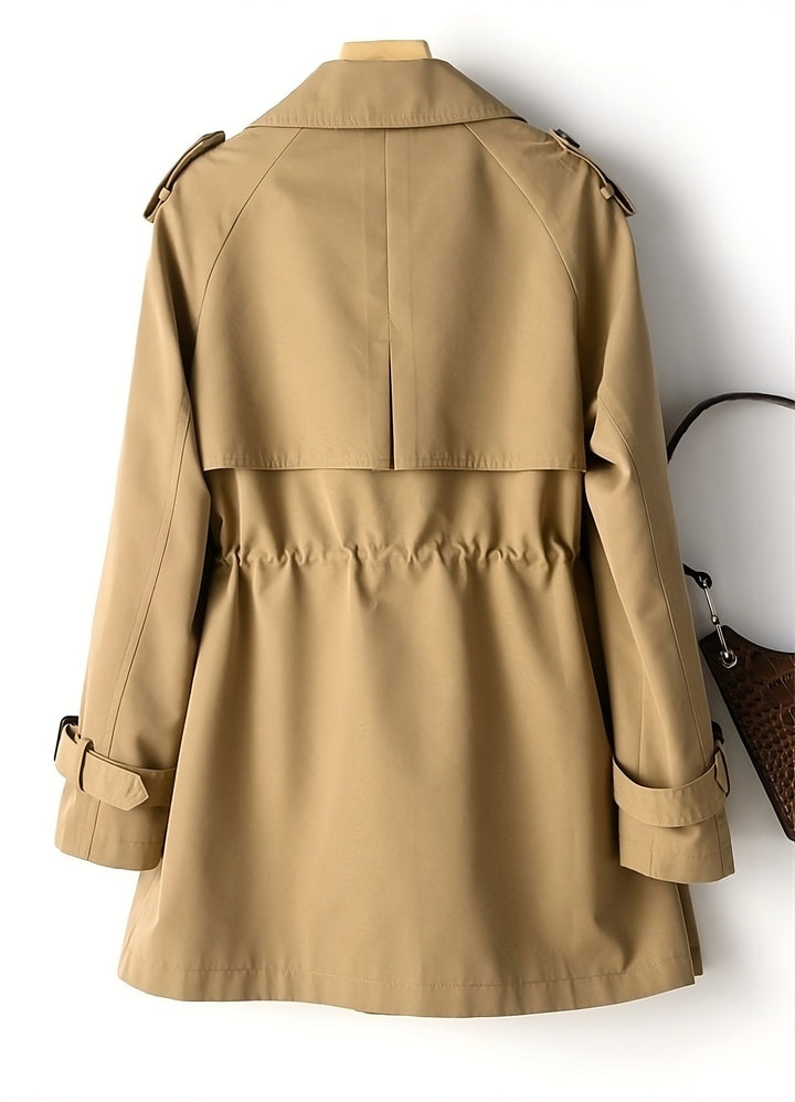 Coffee long trench coat for women, ideal for fall fashion. Elegant autumn style and warm winter outerwear.