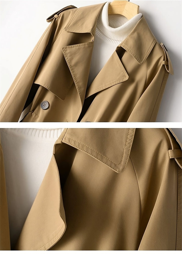 Black women's long trench coat, offering elegant outerwear for fall and sophisticated autumn style.