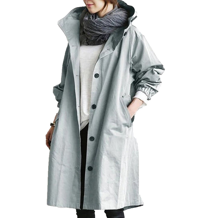 Stylish women's long waterproof jacket, perfect lightweight outerwear for spring & summer rain. Adjustable hood.