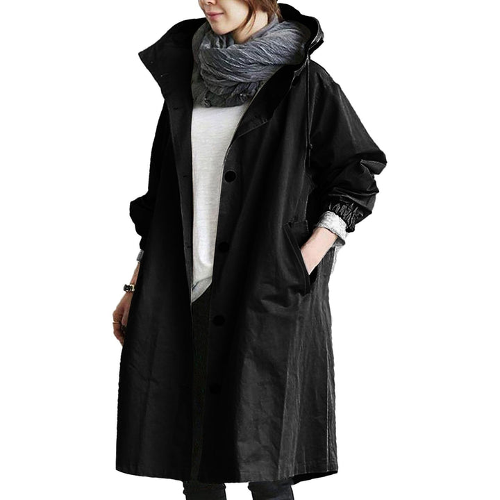 Women's chic long waterproof raincoat, lightweight & breathable, with adjustable hood. Essential spring/summer outerwear.