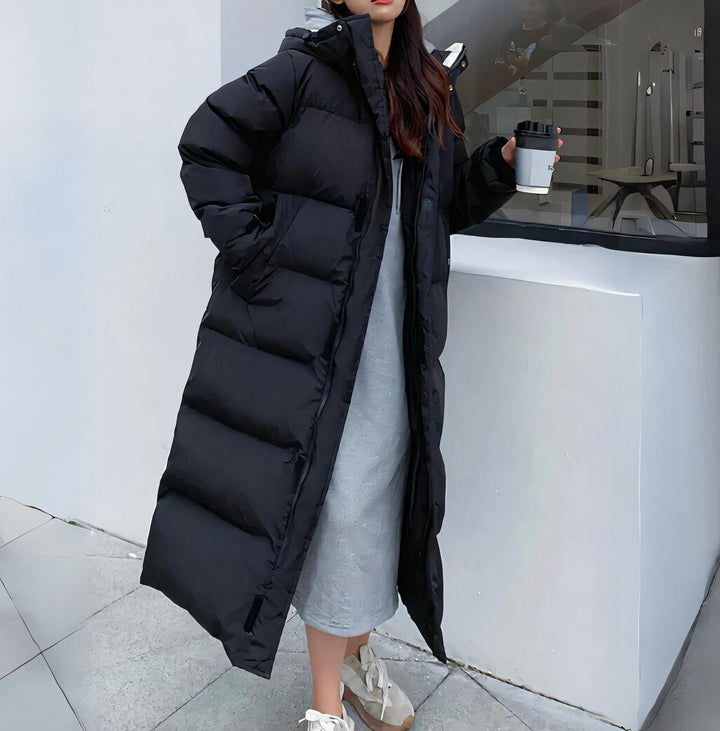 Stylish women's long hooded parka, waterproof & windproof for ultimate cold weather protection.