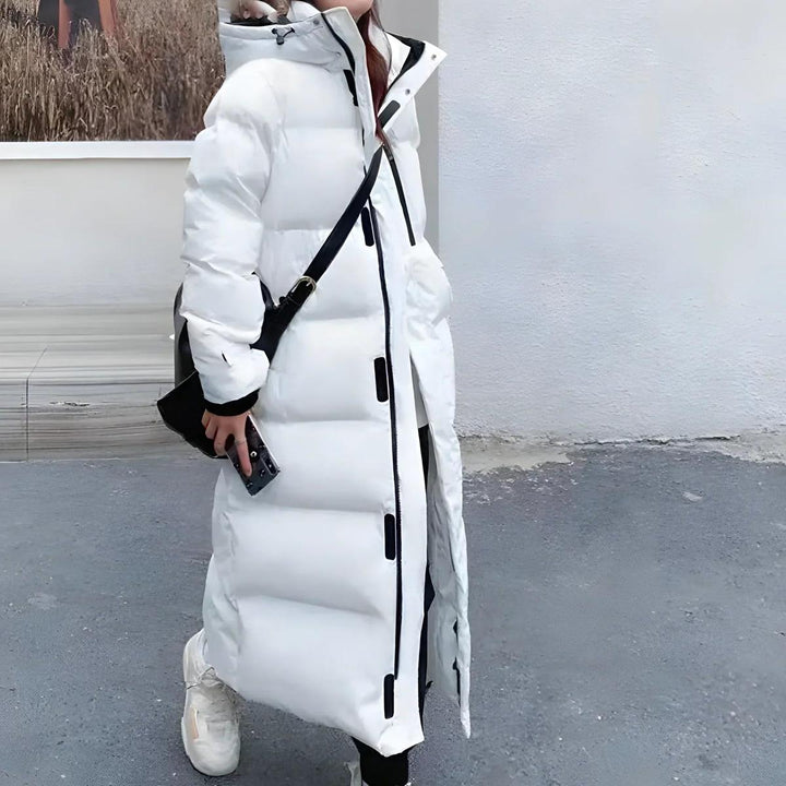 Durable women's long parka, water & windproof for extreme cold, essential winter outerwear.
