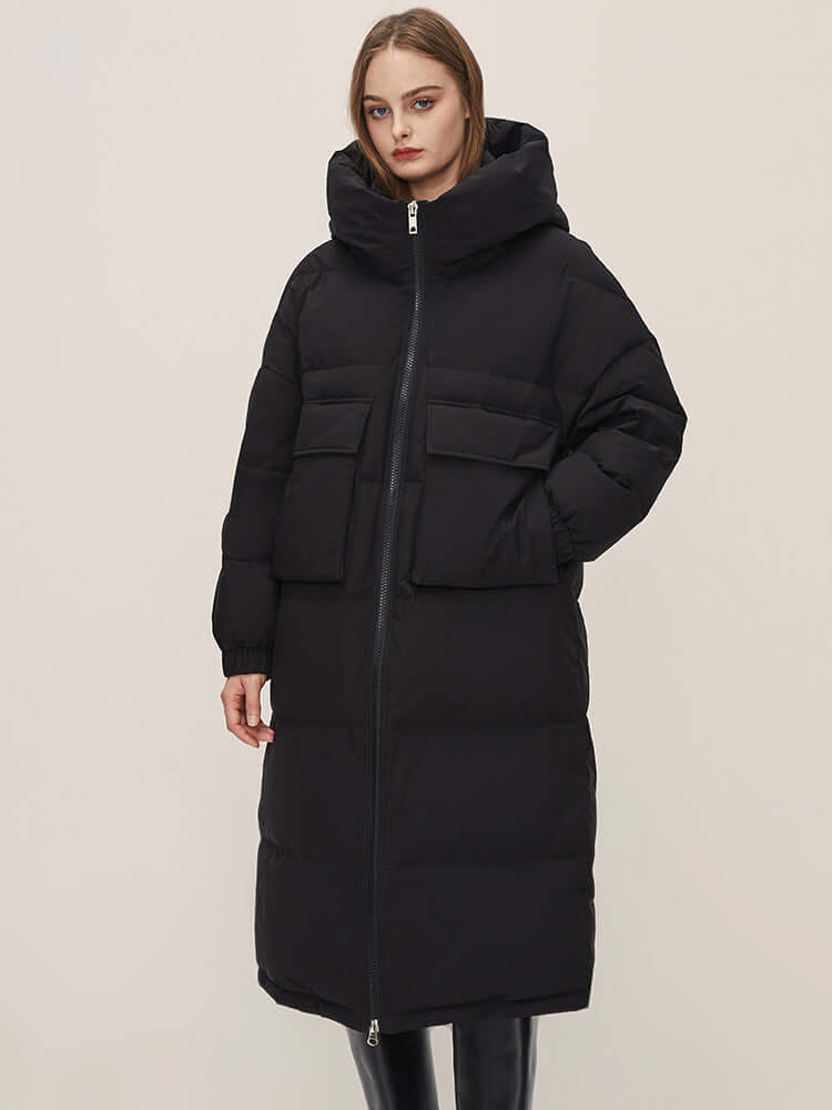 Chic women's long hooded puffer coat, an essential piece of winter fashion for cold days.