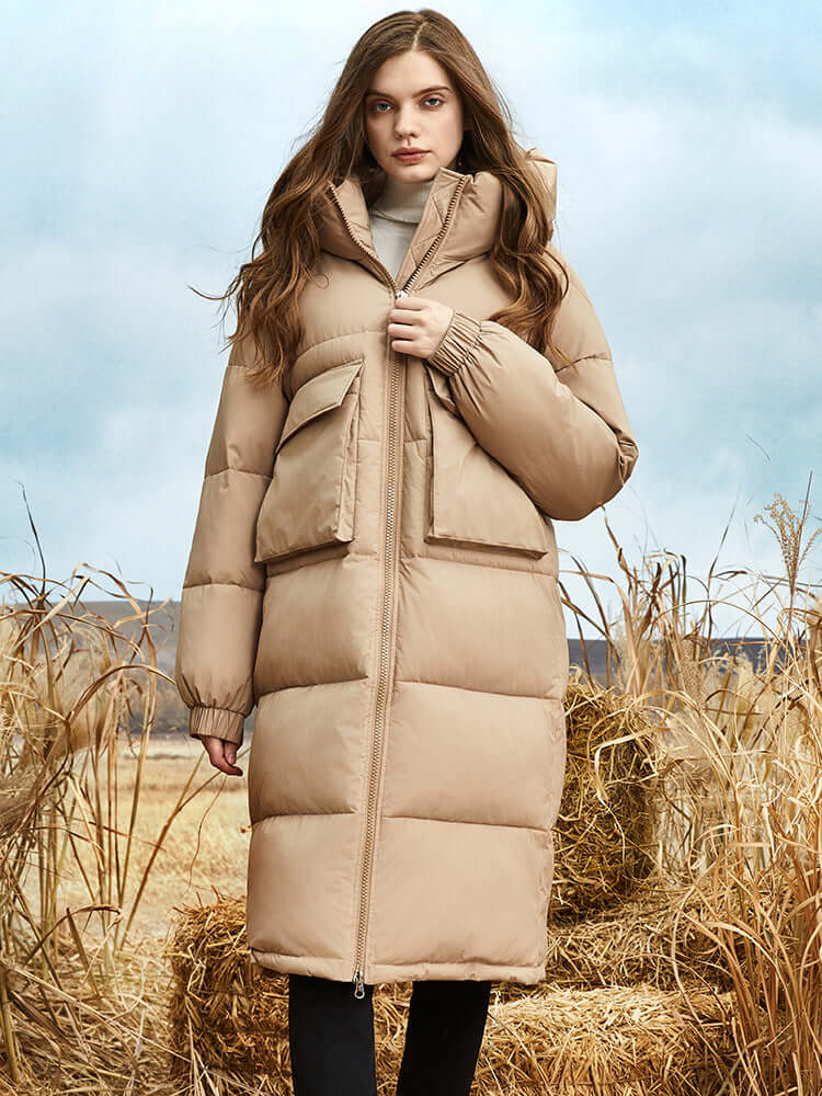 Cozy women's long hooded puffer jacket, excellent warm outerwear for severe winter temperatures.