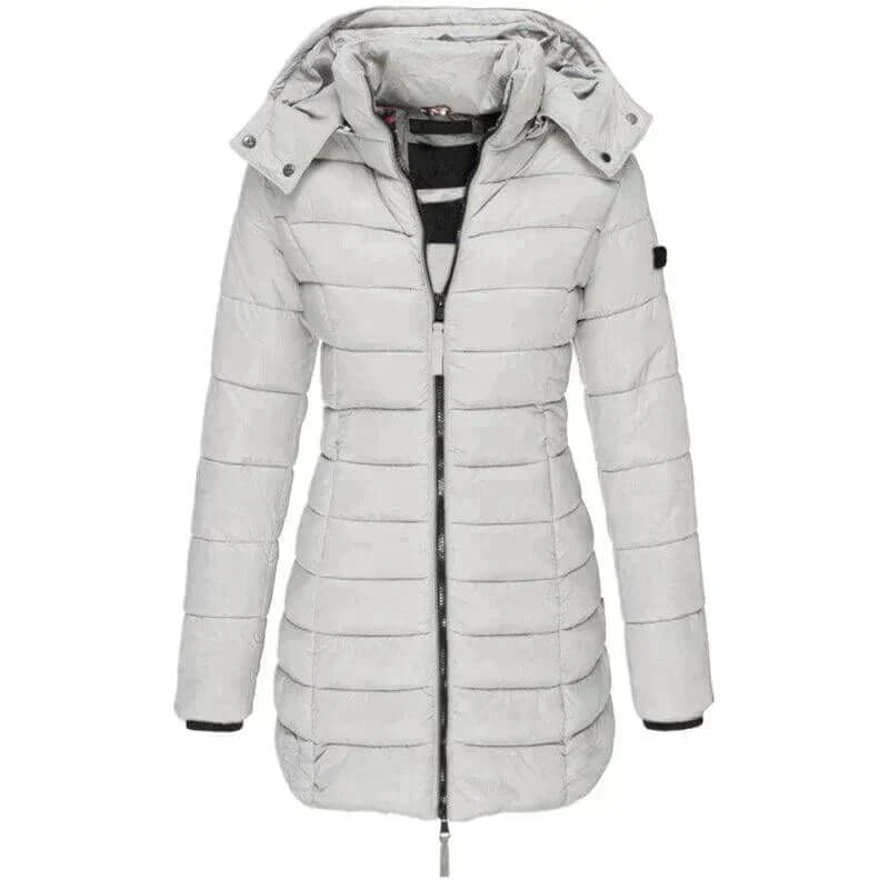 Cozy women's long puffer jacket with hood. Insulated and warm, a must-have for extreme winter cold and style.