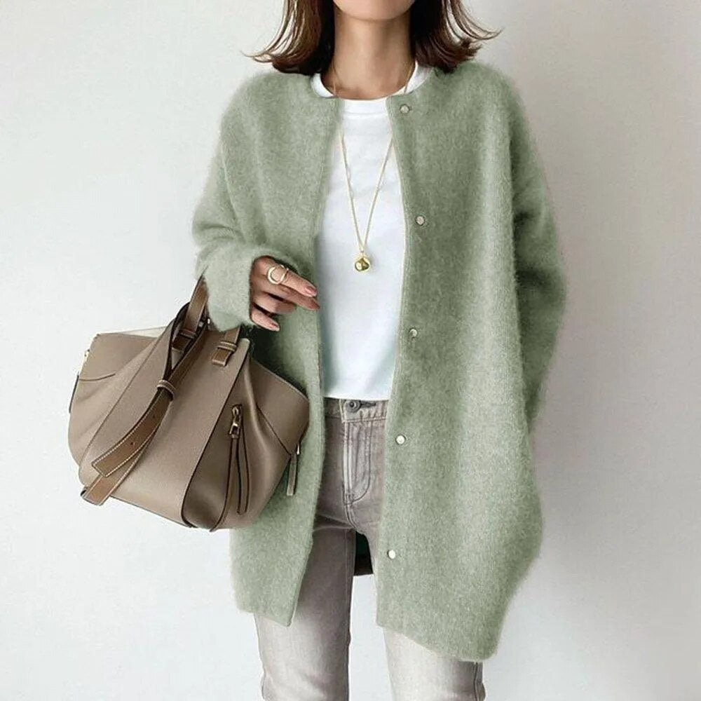 Versatile women's longline oversized cardigan, button-up knit for casual wear, ideal for all-season layering.