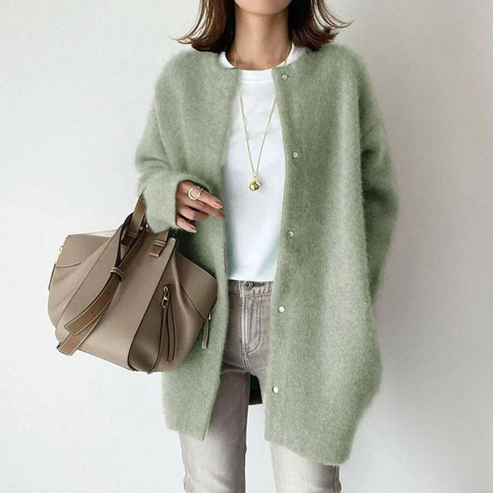 Versatile women's longline oversized cardigan, button-up knit for casual wear, ideal for all-season layering.