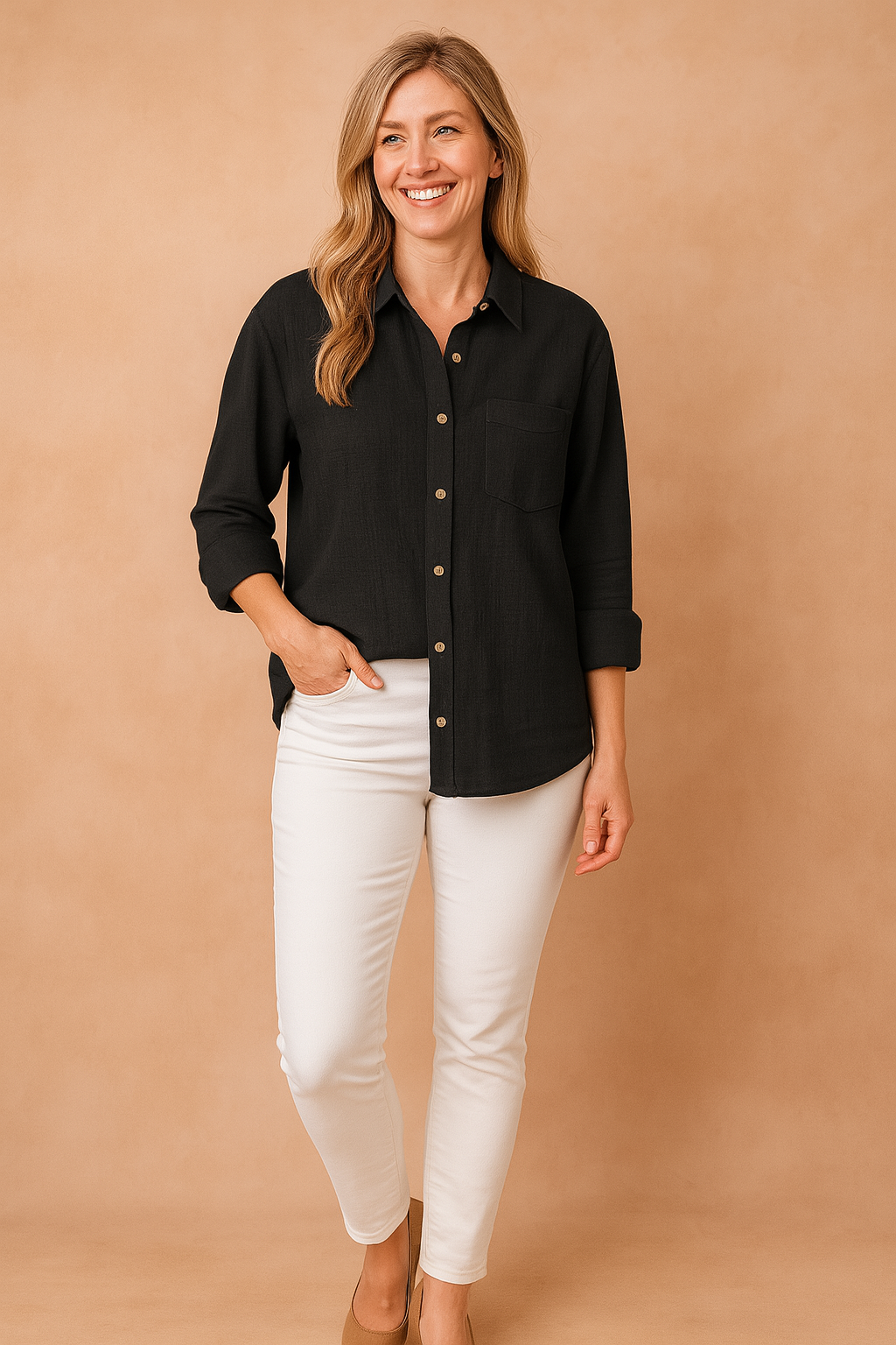 Modern women's loose fit button-up blouse with chest pocket. Versatile long sleeve top for casual fashion.