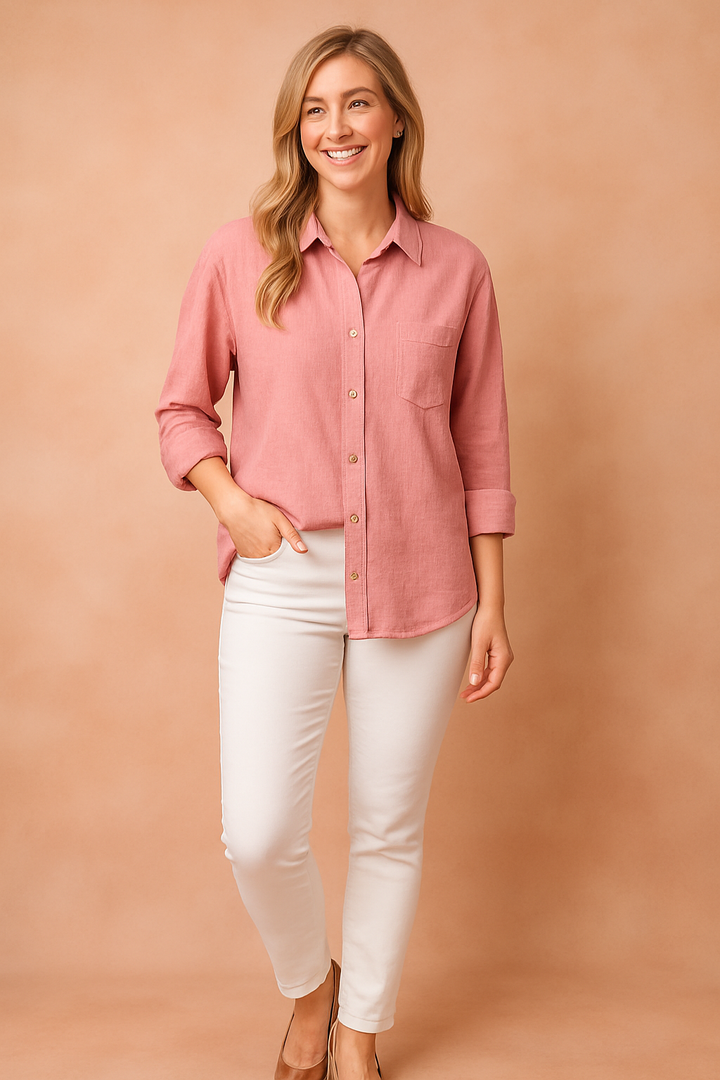Relaxed women's casual button-up blouse. Loose fit, long sleeves & chest pocket make this top a versatile wardrobe essential.