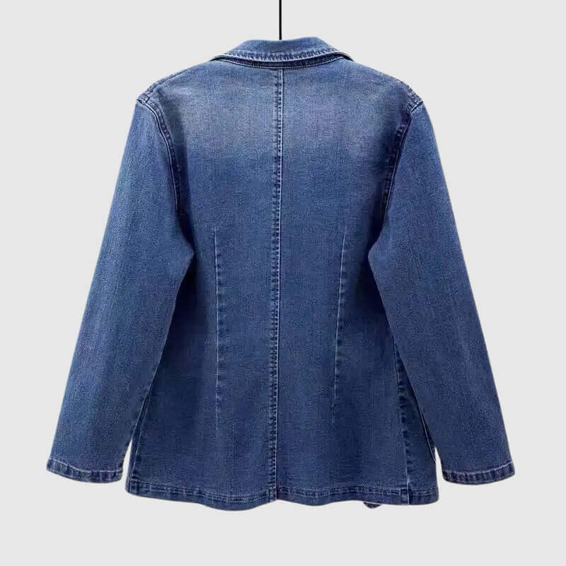 Blue denim loose fit women's jacket with a classic collar. Comfortable and stylish long sleeve casual outerwear.