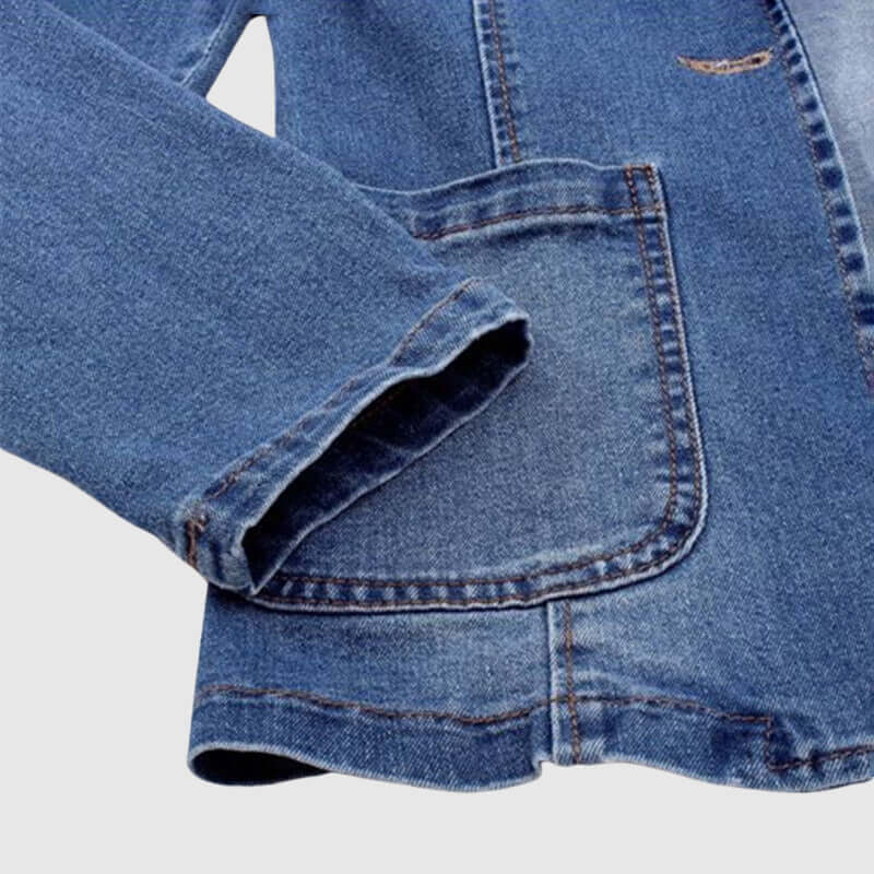 Stylish women's blue denim jacket, loose fit with a collared design. Versatile outerwear for casual everyday fashion.