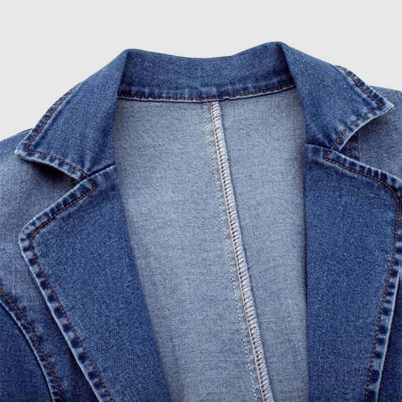 Casual women's loose fit denim jacket. Features a classic collar, perfect for stylish everyday blue denim fashion.