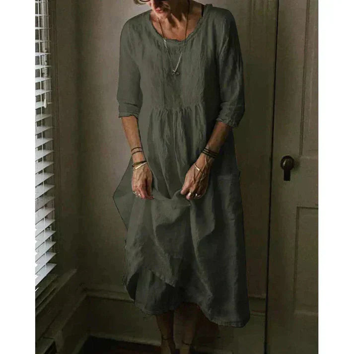 Women's loose fit cotton linen midi dress, round neck, comfortable and stylish for effortless casual spring fashion.