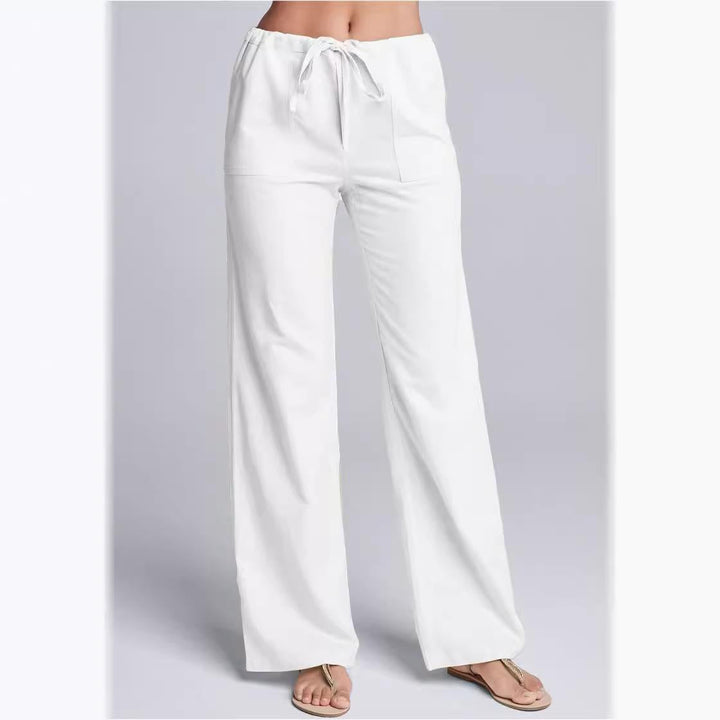 Women's loose fit cotton linen trousers with drawstring waist, ideal for casual summer comfort & everyday wear.