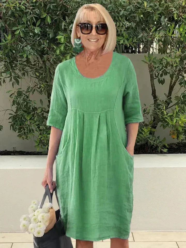Effortless women's casual flowy dress with a relaxed loose fit and useful deep pockets.