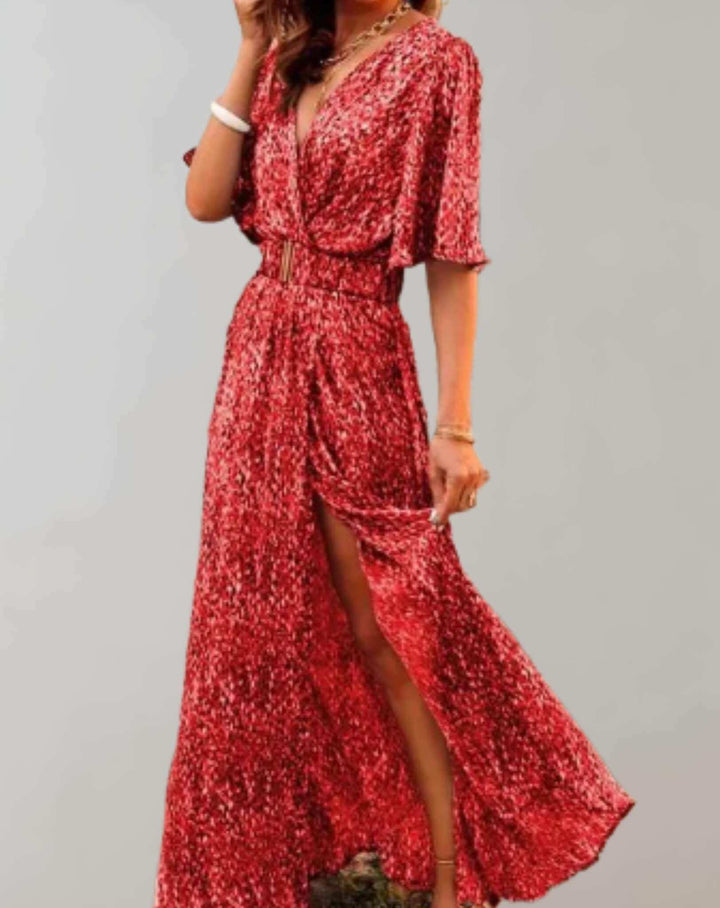 Full-length view of an elegant floral slit dress for women, showing its flowy fabric & perfect midi length for spring.