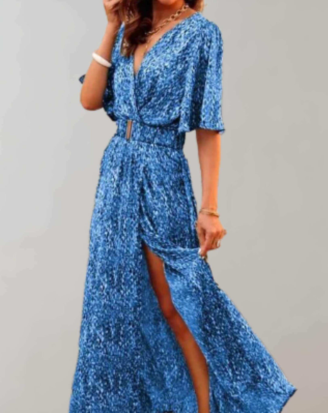 Comfortable women's floral summer dress featuring a loose fit and elegant slit, great for vacation or casual outings.